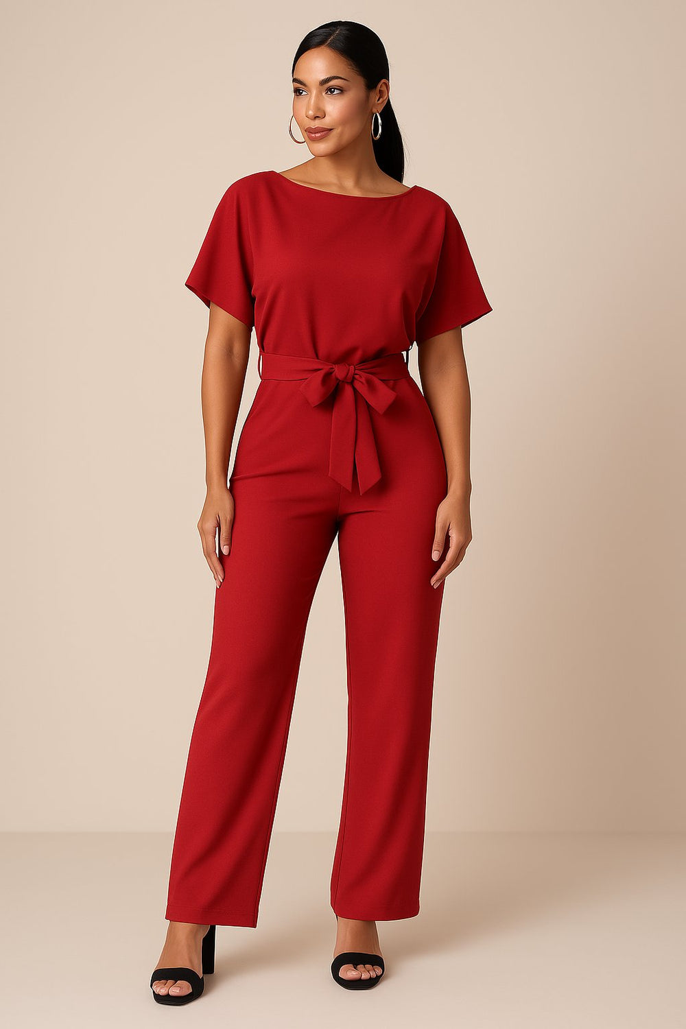 Women's wide leg jumpsuit with short sleeves and adjustable belt, featuring a modern design perfect for casual or dressy occasions. 1