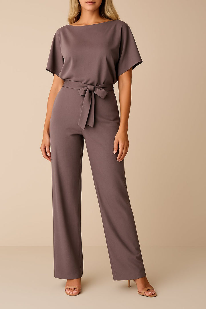 Women's wide leg jumpsuit with short sleeves and adjustable belt, featuring a modern design perfect for casual or dressy occasions. 6