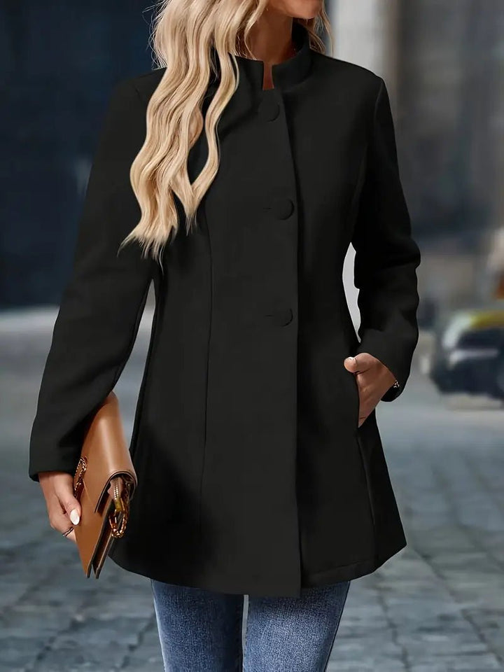 Women's wool blend coat featuring a stand collar and button front, designed for elegance with a mid-length cut, perfect for stylish layering in cooler weather. 6
