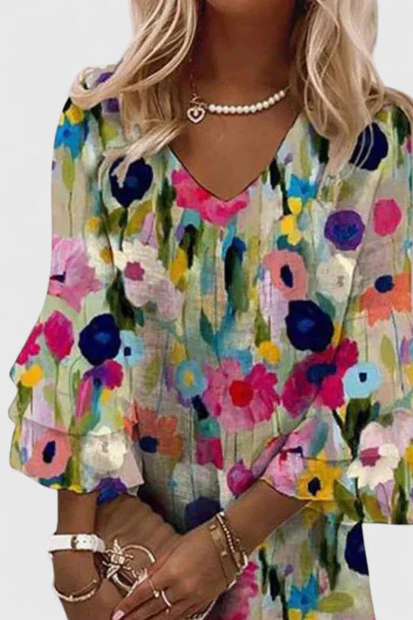 Womens floral mini dress with V-neckline and comfortable fit, perfect for wedding guests and summer cocktails. 2