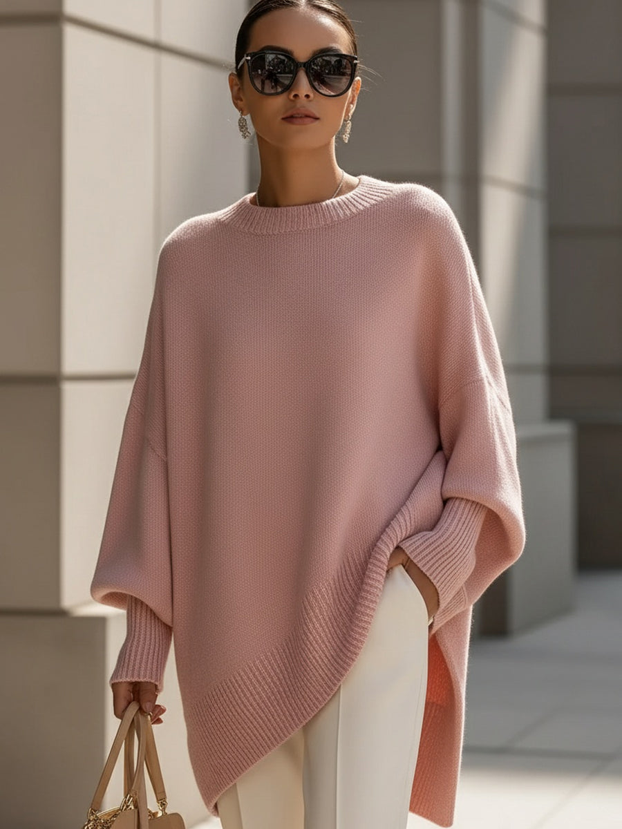 Wool blend oversized sweater with asymmetrical hem, featuring a cozy and elegant design, perfect for stylish layering in cooler weather. 5