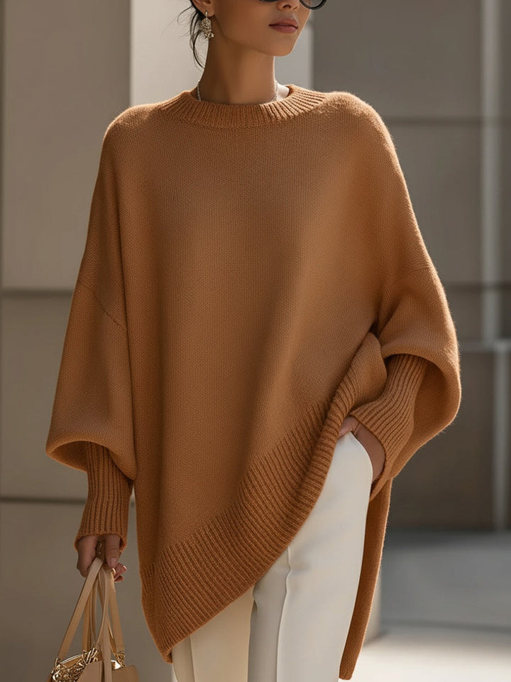 Wool blend oversized sweater with asymmetrical hem, featuring a cozy and elegant design, perfect for stylish layering in cooler weather. 7